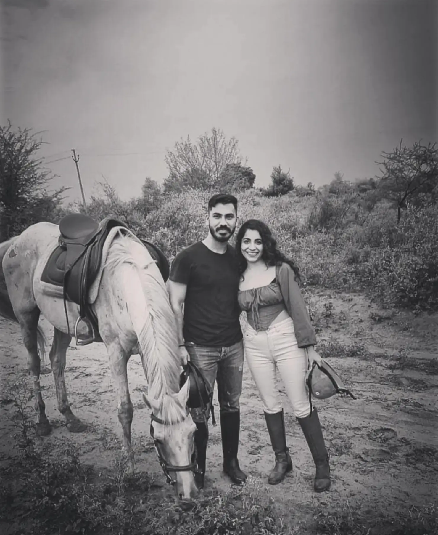 Shreya and Angad together with a horse on a country trail